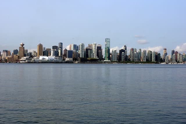 Canada Place with its white "sails" and the Harbour Centre tower to the left